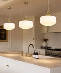 Vintage Brass Milk Glass Pendant Lights Fixture, Pleated Glass Chandelier hung over a modern kitchen island.