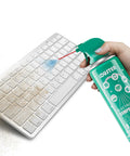 Keyboard Cleaner Air Spray For Computers And Electronics 10oz Can Duster blasting dust from a keyboard