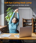 LED Desk Lamp With Clamp And Base Two In One Desk Light With 50.7 Inch Adjustable Swing Arm in use at an office desk
