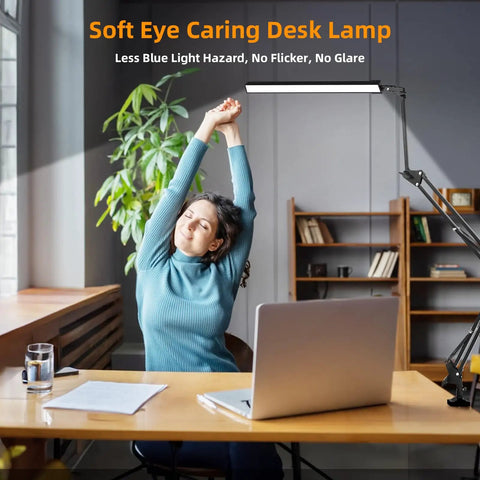LED Desk Lamp With Clamp And Base Two In One Desk Light With 50.7 Inch Adjustable Swing Arm in use at an office desk