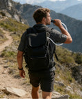 Hiker using All Day Hydration Bladder for Hiking and Outdoors 1.5L to 2L Large Opening Water Reservoir Lightweight