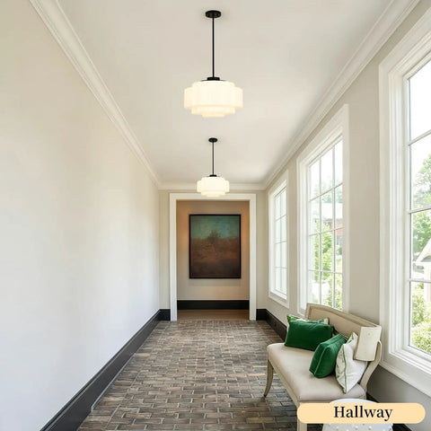 puncoll Vintage Black Milk Glass Pendant Light, 15.7'' White Chandelier illuminating a modern hallway with a stylish décor.