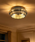 19” Boho Caged Ceiling Fan with Lights and Remote, 6-Speed Flush Mount illuminated in a cozy room setting.
