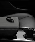 Level Up Your Ride With Tesla Model 3 And Model Y Key Fob Wireless Remote for swift door locking on armrest.