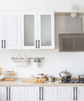 Modern white kitchen with 10 Pack 4 Inch 102mm Matte Black Cabinet Handles on cabinets and drawers