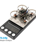 Air65 II Brushless Whoop Quadcopter For 1S 65mm Micro FPV Ultralight Pocket Sized Power weighing 16.64g on digital scale