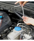 Person using Complete 4 Piece Hex Socket Wrench Set Featuring Hella Durable Steel Allen Keys in 8 10 12 14 Mm Sizes for vehicle maintenance.