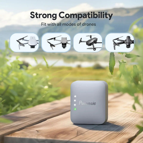 Portable FAA Compliant Remote ID Drone Broadcast Module with camera, IP54, long battery, safe charge cable on wooden surface