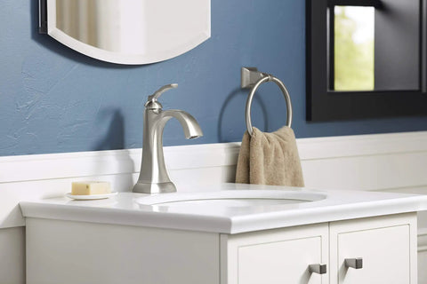 Ridgeport Single Control Lav Faucet With Brushed Nickel Finish on white sink, modern bathroom aesthetic