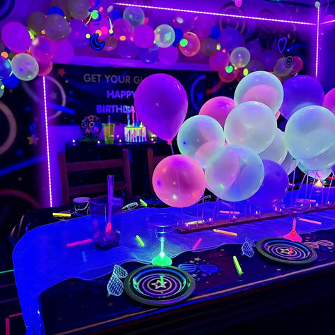 Black Light Strip Kit With 79 Feet Of Flexible LED Lights Powered By 12V 1440 LEDs For Lit Glow At Halloween And Christmas Parties Easy Setup For Fluorescent Dance Floors Not Waterproof For Indoor Use creating vibrant glow at a party
