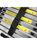 12.5ft Telescoping Aluminum Ladder With Locking Mechanism Extendable And Collapsible For Attic And Home Or Outdoor Use Heavy Duty 330 Lb Capacity Easy To Store And Setup Built For Pro Grade DIY, folded aluminum rungs with strap and warning labels