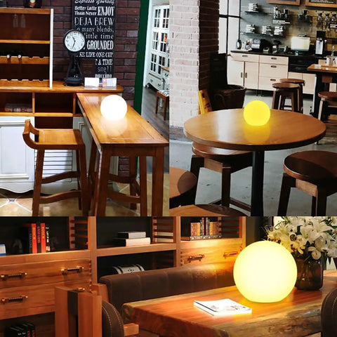 Ultra Fun Waterproof 10 Inch RGB LED Ball Light Orb With Remote Control illuminating on tables indoors