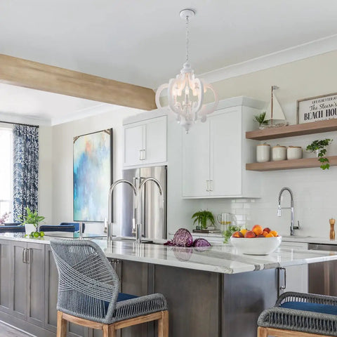 Farmhouse Six Light Wood Chandelier In Distressed White With Cozy Vibe and Warm Glow in modern kitchen setting