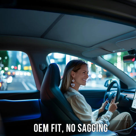 Installed Tesla Model Y sunshade for glass roof; magnetic foldable UV-blocking shade inside car
