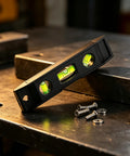 Magnetic Torpedo Level 6 Inch, 3 Bubble Spirit Measuring Tool on metallic surface with screws, showing precision acrylic vials.