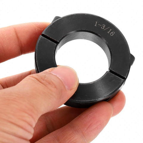 Heavy Duty Double Split Shaft Collars For 1-3/16 Inch Shafts shown in hand, black oxide coated steel, two piece clamping design.
