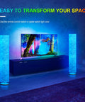 Lit 52 Inch Slim Modern Floor Lamp With RGB Color Changing Tyvek Fabric Shade beside TV in living room
