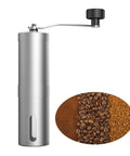 Portable Manual Coffee Grinder With Ceramic Burr, Adjustable Settings And Detachable Hand Crank, shown with coffee grounds and beans