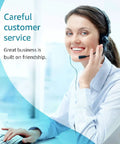 Customer service representative wearing headset at desk smiling
