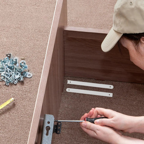 Installing full extension drawer slides for wardrobes, white bottom mount cabinet glides in progress, showing durable plastic slides