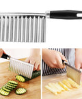 Litoexpe crinkle cutter with stainless steel blade and black handle; shown slicing cucumbers and potatoes.