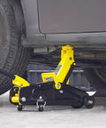 Low Profile 2 Ton Floor Jack For Cars Heavy Duty Iron Hydraulic Car Jack With Quick Lift Pump 4.9 To 13.2 Inch Lift Range Single Piston Yellow Finish lifting a vehicle