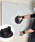 Rock Solid Heavy Duty Glass Sucker Carrier For Moving Granite Or Stone Slabs With Nifty Vacuum Cup and Ergonomic Grip in use with stone slab.