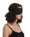 Silk Sleep Mask With Contoured Foam Padding For Light Blocking And No Pressure shown on model side view