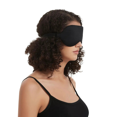 Silk Sleep Mask With Contoured Foam Padding For Light Blocking And No Pressure shown on model side view