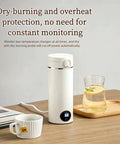 Grab And Go Travel Kettle, 500 Ml Heated Water Cup on a wooden table with a cup and glass of lemon water.