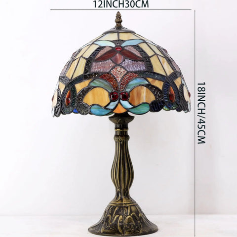 Orange Stained Glass Flower Tiffany Style Table Lamp For Reading Desk And Bedside Use 12 Inch Wide Shade 18 Inch Tall With Antique Green Bronze Base UL Listed Cord Switch Ideal For Bedroom Living Room Or Home Office Decor, full view of lamp on white background.