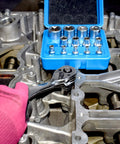 14-Piece E-Torx Socket Set for 1/4, 3/8, and 1/2 inch drives in use on engine with blue case in background