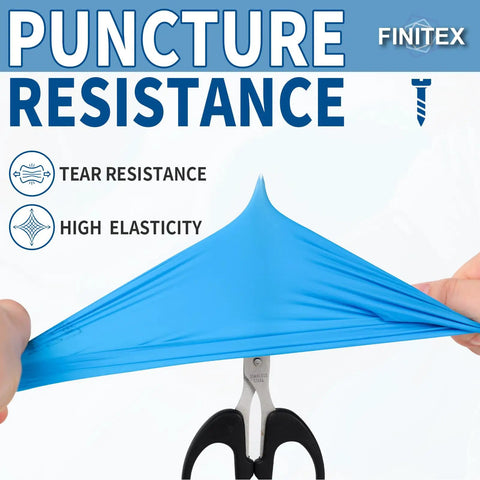 Blue Nitrile Disposable Exam Gloves Thick 3.5 Mil Powder Free Latex Free showing tear resistance with scissors