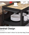 Three Tier Industrial Rolling Bar Cart With Thick Oak Shelves And Silent Casters For Living Room Hosting Hella Smooth Mobile Serving Trolley Top Shelf Storage Rack featuring handrail and dishes.