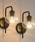 Rustic Wall Sconces Set Of 2 With Hand Blown Bubble Glass Shades, modern matte black vanity lights illuminating softly.