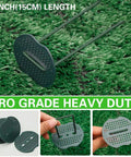 Green Painted Turf Stakes Set With 50 Stakes And 50 Buffer Washers 6 Inch 11 Gauge Heavy Duty Lawn Spikes close-up on grass