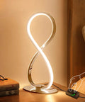 Eight Shape Spiral Led Table Lamp With Stepless Dimmable Brightness Warm White Light Modern Silver Nightstand Desk Lamp on table