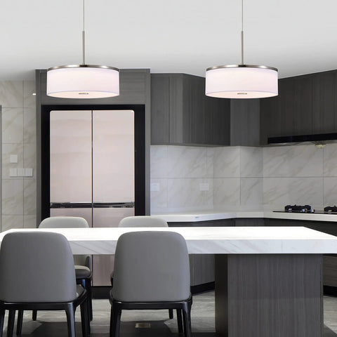 Drum Pendant Light With Brushed Nickel Trim And Linen Shade 14 Inch LED Fixture in modern kitchen above island.