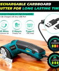 Cordless Electric Cardboard Cutter Scissors With 3000 Mh Battery charging with USB Type C cable on a wooden surface.