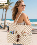 Woman carrying Large Beach Tote Bag For Women Waterproof And Sandproof With Zipper And Wet Pocket Extra Spacious on beach