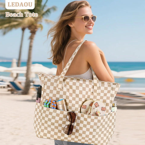 Woman carrying Large Beach Tote Bag For Women Waterproof And Sandproof With Zipper And Wet Pocket Extra Spacious on beach