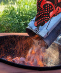 BBQ Gloves Heat Resistant Up To 1472 Fahrenheit Silicone Non Slip Long Kitchen Gloves handling hot coals for barbecue.