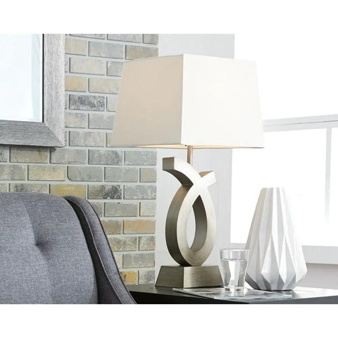 Modern 28 Inch Art Sculpted Table Lamp Two Pack in Silver Finish With White Rectangular Shade Resin Base in living room setting