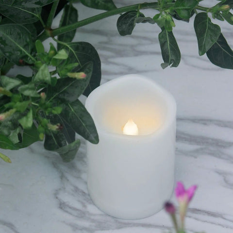 Waterproof Outdoor LED Flameless Candle With Remote And Timer, 3x4 inch white plastic, in garden setting