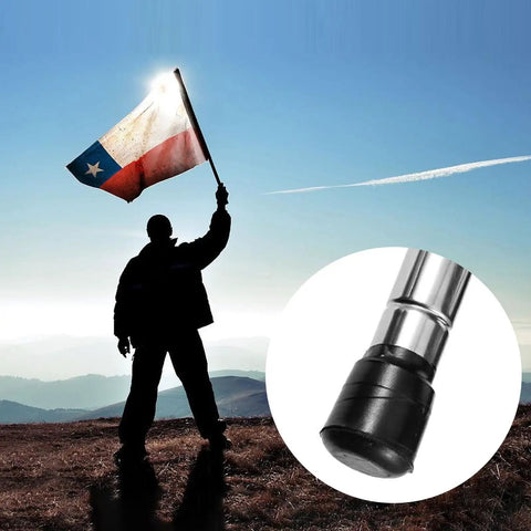 Individual holding flag at sunset with Eight Piece Color Guard Weight Anchor Set Featuring Sturdy Flag Pole Caps And Reliable Black White Electrical Tape For Marching Bands And Honor Guard Drills Delivering Hustle Free Setup And Legit Stability On Any Field.