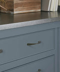 Vaile Matte Black Cabinet Pull 3-3/4 Inch Center to Center, 4-13/16 Inch Overall Length, installed on gray kitchen cabinet drawers.