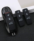 Porsche Key Fob Button Cover For Cayenne And Macan, Soft Silicone Case, displayed with loose replacement button covers