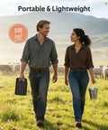 Two people walking in a field with Portable Solar Powered Fence Energizer Delivers 0.20J Output And 8KV For Up To 10 Miles Of Fence Protection