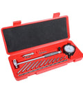 Bore gauge set with dial indicator in open red plastic case and multiple stainless steel rods for 2 to 6 in bores.