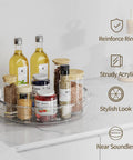 Three Pack Lazy Susan Turntable Organizer Set For Cabinets Pantry Fridge And Countertop Storage Makes Kitchen Organization A Breeze 360 Degree Rotating Spice And Condiment Organizer In 12 Inch Size on countertop with spices and bottles; clear acrylic material.